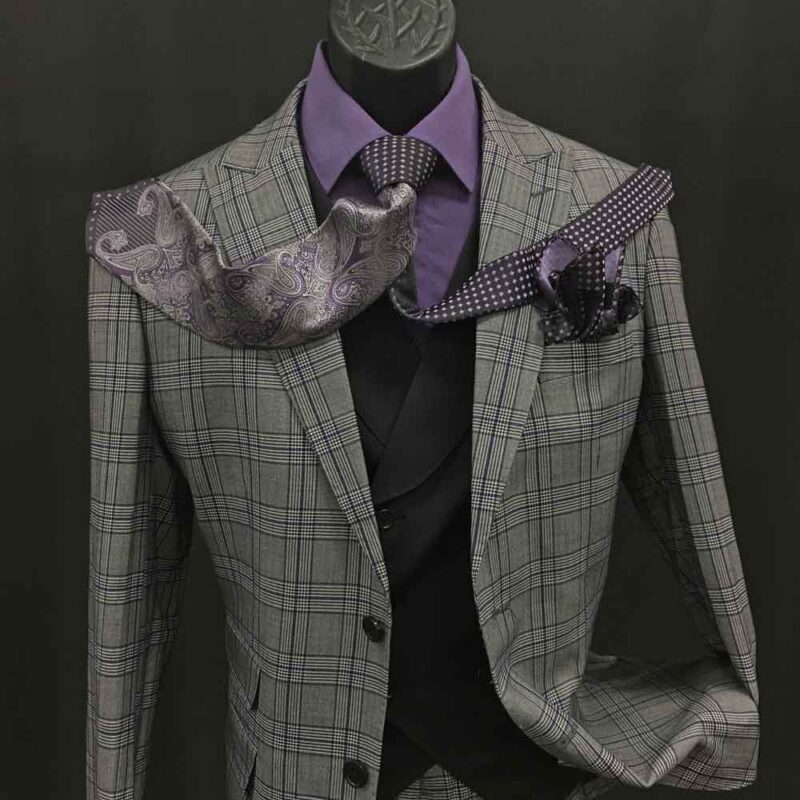 purple shirt grey vest