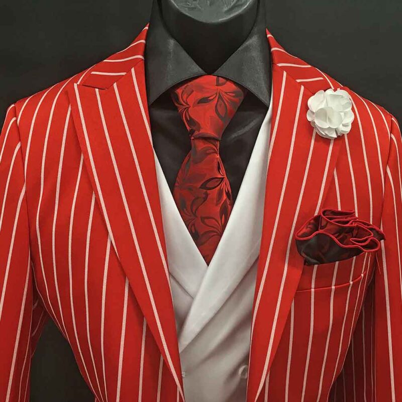 white suit red shirt