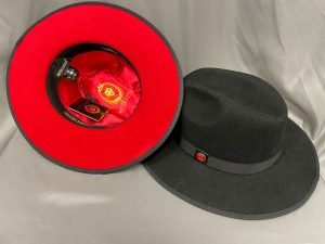 Black hat with red inside
