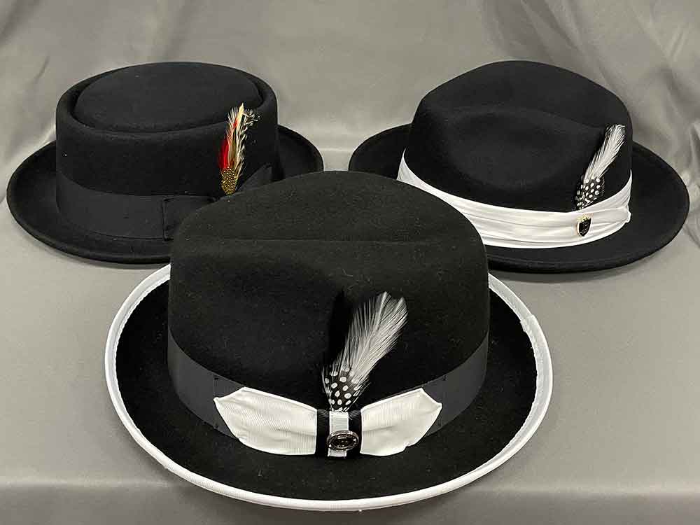 Black hats with feathers